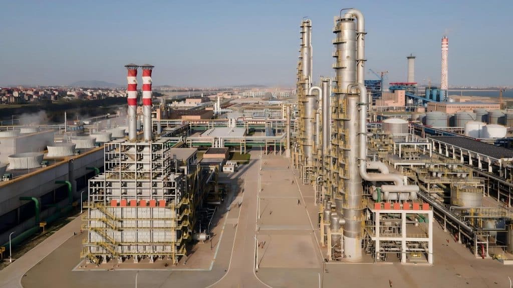 Aerial view of chemical plant chimney 01